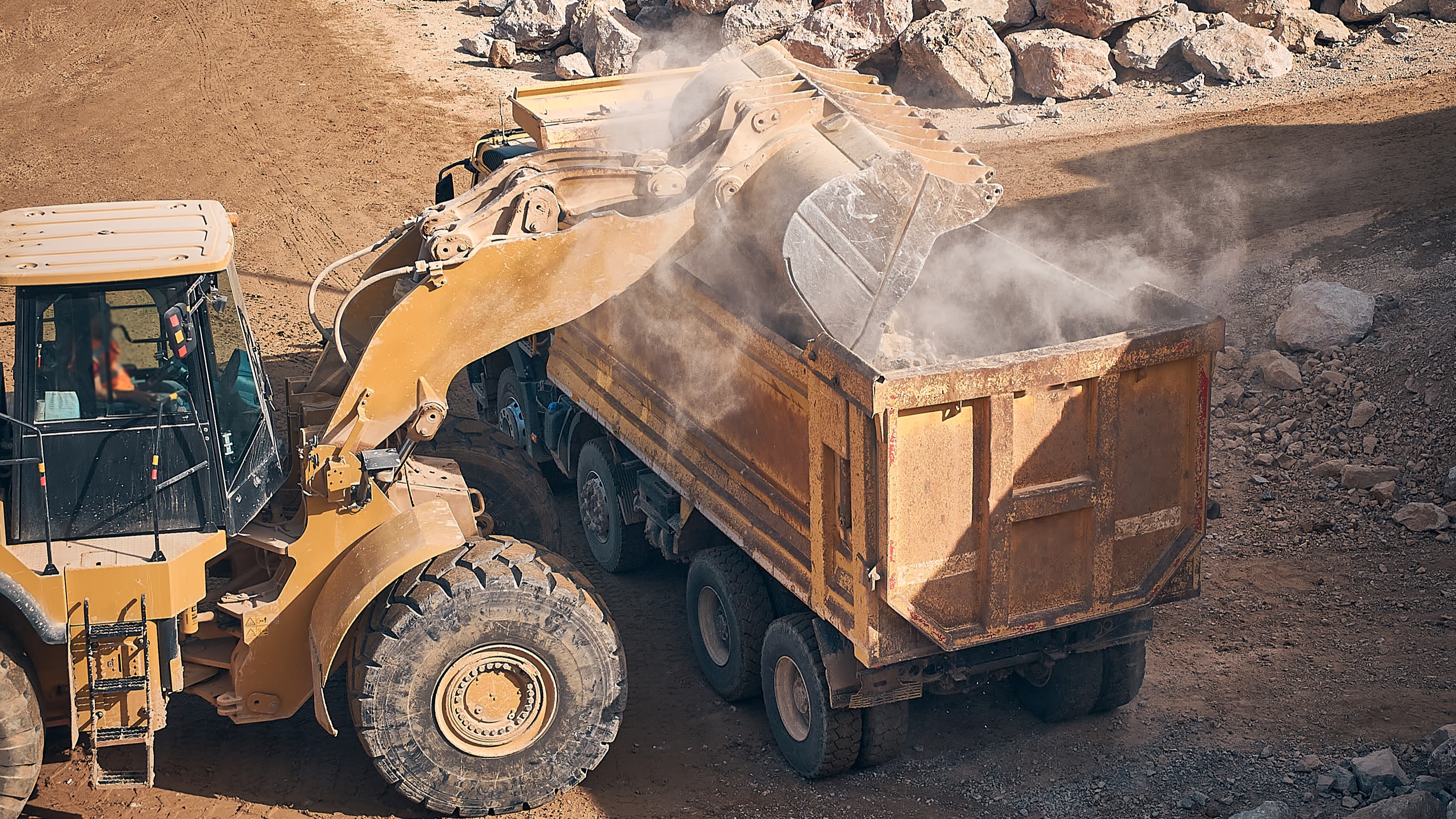 heavy haul trucks operate in open-pit mines.jpeg